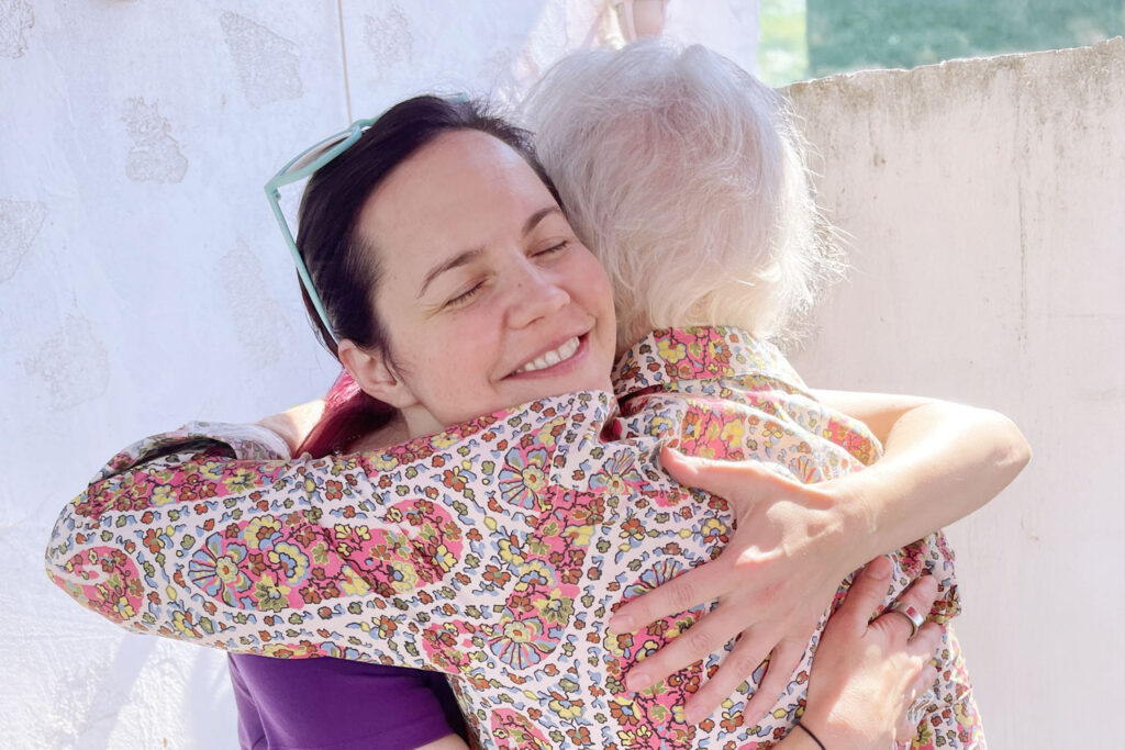 Alison Kawa participating in a 5 Breath Hug